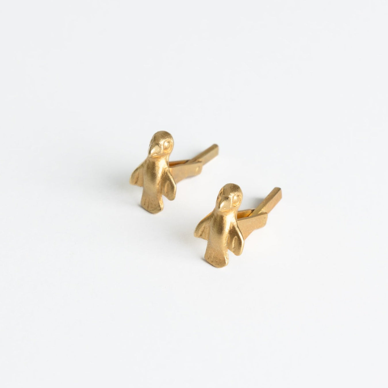 Gemelos Pájaro Oro